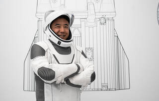 Astronaut Satoshi Furukawa of SAXA, mission specialist of NASA's SpaceX Crew-7 mission, is pictured in his pressure suit during a crew equipment integration test at SpaceX headquarters in Hawthorne, California. 