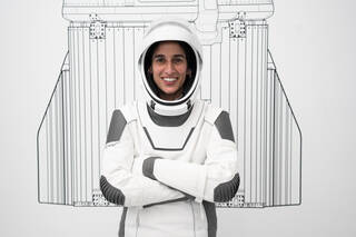 NASA astronaut Jasmin Moghbeli, commander of NASA's SpaceX Crew-7 mission, is pictured in her pressure suit during a crew equipment integration test at SpaceX headquarters in Hawthorne, California. 