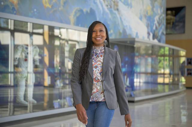 Environmental Portrait of Trinesha M. Dixon for Faces of NASA Project in the Teague Lobby of Building 2 at NASA's Johnson Space Center in Houston.