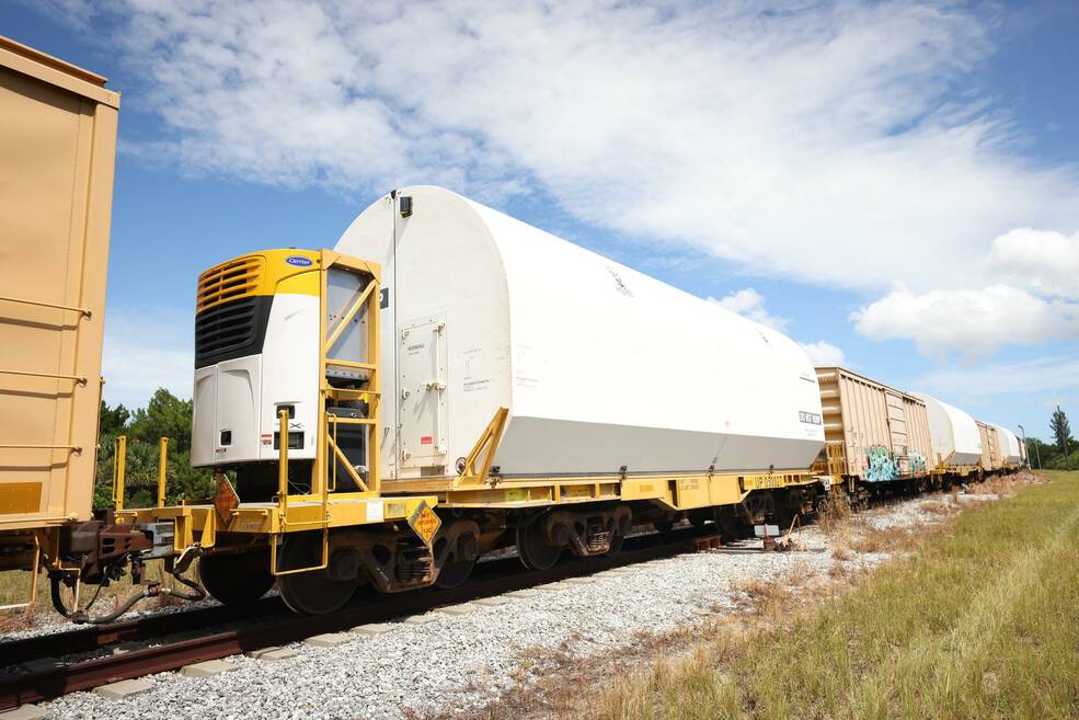 The 10 booster motor segments that will form the NASA Space Launch System rockets twin, five-segment solid rocket boosters for the agencys Artemis II mission, arrive at Kennedy Space Center on Monday, Sept. 25, 2023.