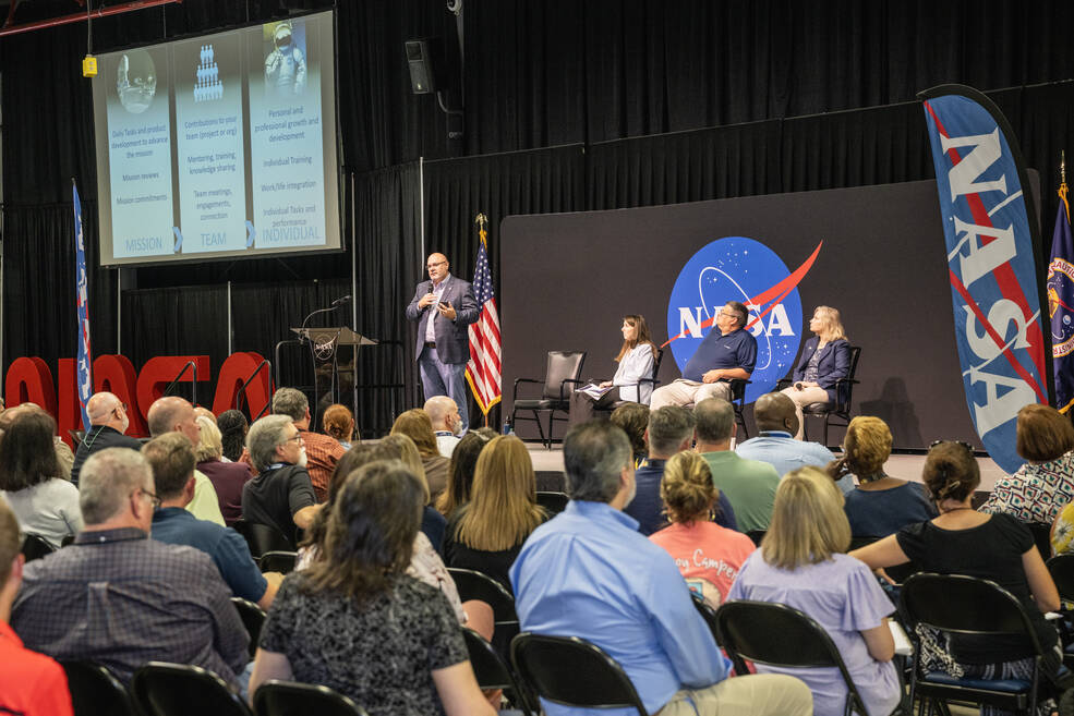 Joseph Pelfrey, standing, acting director of NASAs Marshall Space Flight Center, talks during the supervisors all-hands meeting Sept. 11 in Activities Building 4316.