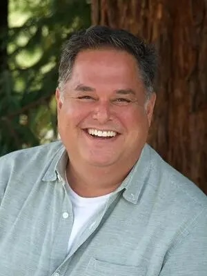 Michael Kubo Portrait in a light green button up shirt