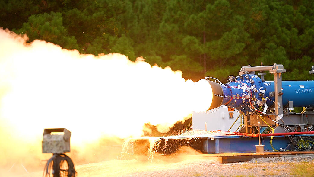 Engineers in the East Test Area at NASAs Marshall Space Flight Center monitor a 24-inch booster motor test Sept. 14.