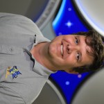 A portrait of Kennedy Space Center's Reed Divertie with the Launch Services Program insignia in the background.