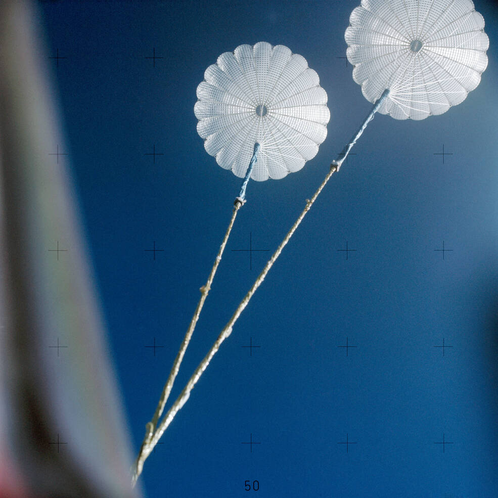 Following reentry, two drogue parachutes opened at 24,000 feet to slow and stabilize the Command Module