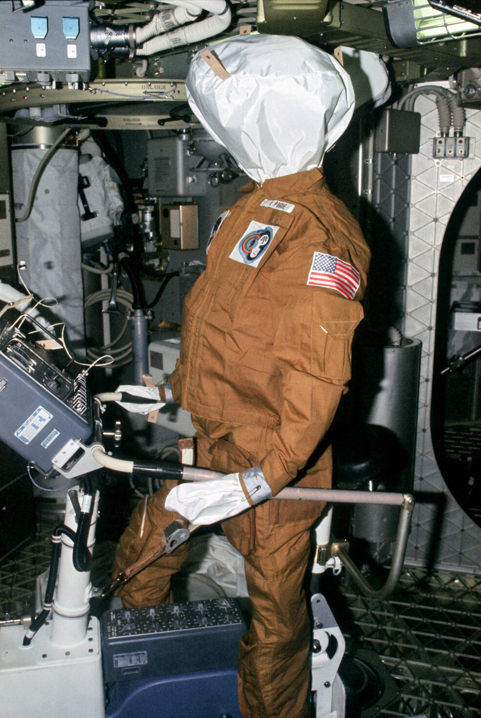 The Skylab 3 astronauts stuffed the Skylab 4 astronauts’ flight suits with clothes and posed them around the station for them to find when they arrived at the station.