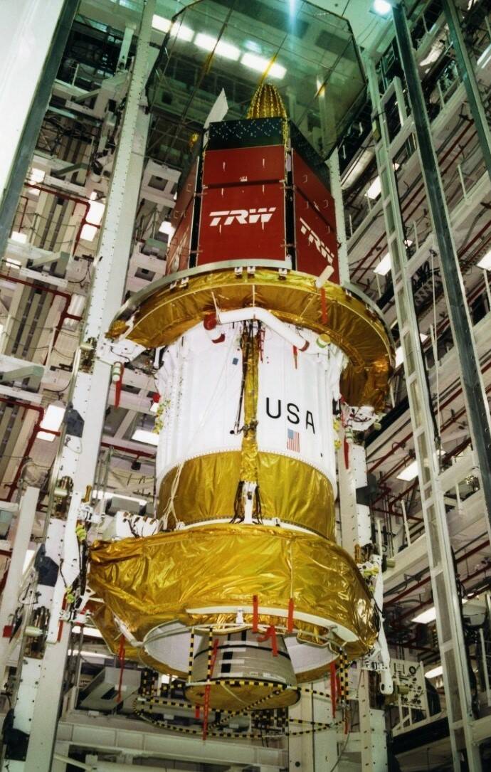 TDRS-3 stacked with its Inertial Upper Stage in the Vertical Processing Facility at NASA’s Kennedy Space Center (KSC) in Florida