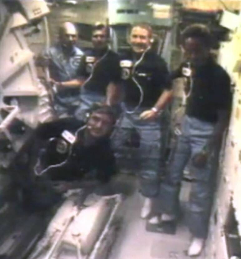 STS-8 crew during the congratulatory telephone call from President Ronald W. Reagan
