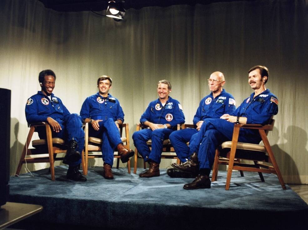 The STS-8 crew takes a congratulatory phone call from President Ronald W. Reagan