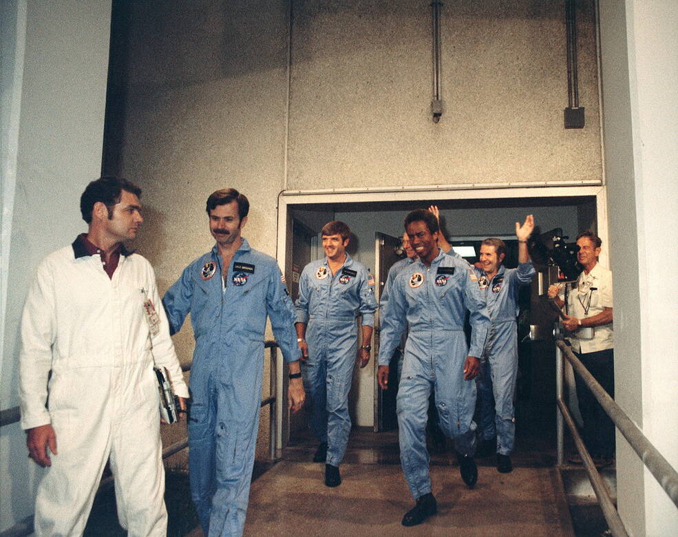 STS-8 crew prepares to board the van to take them to Launch Pad 39A