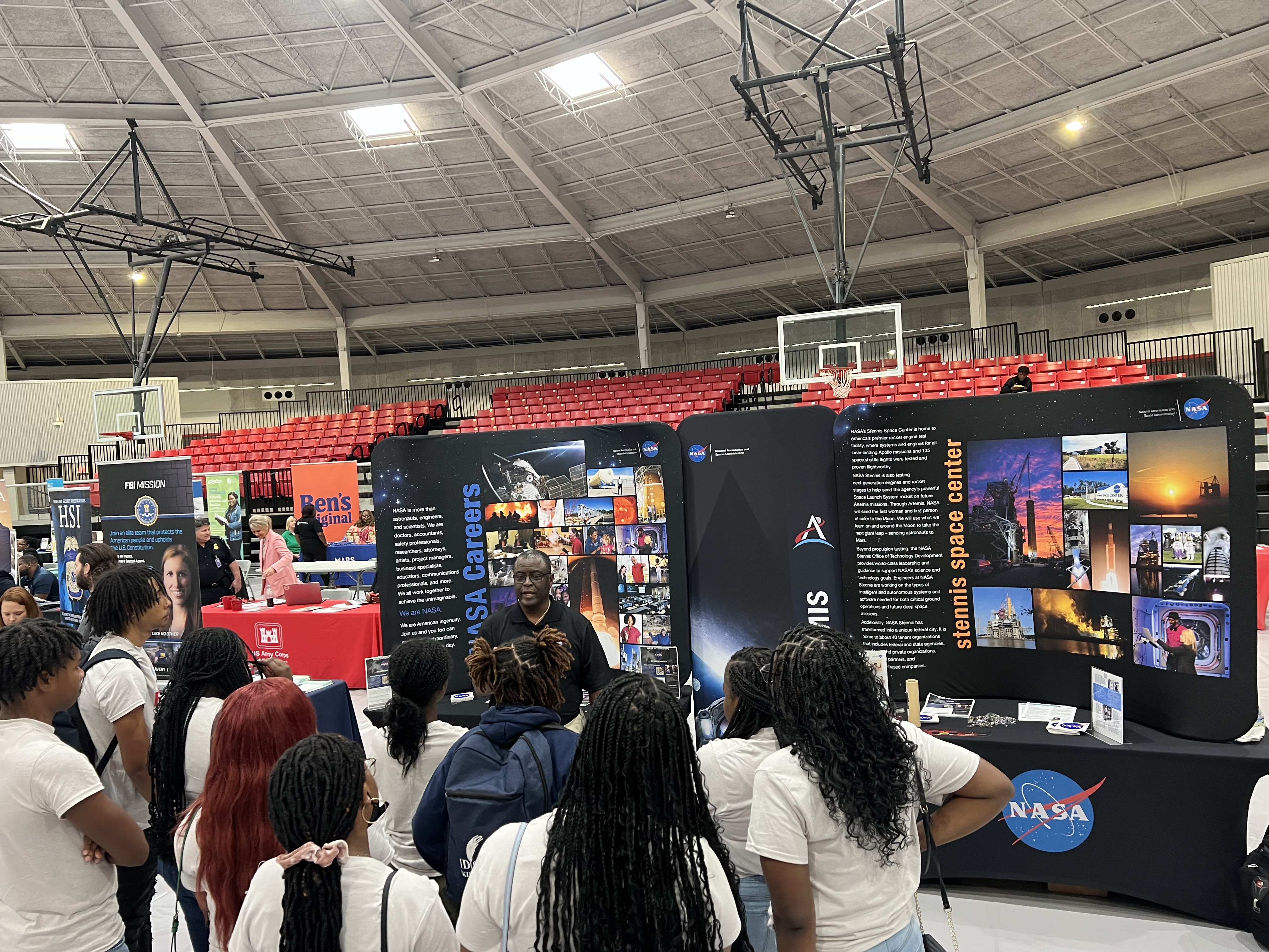 Employees from NASA Stennis and NASA Marshall engage with career fair attendees