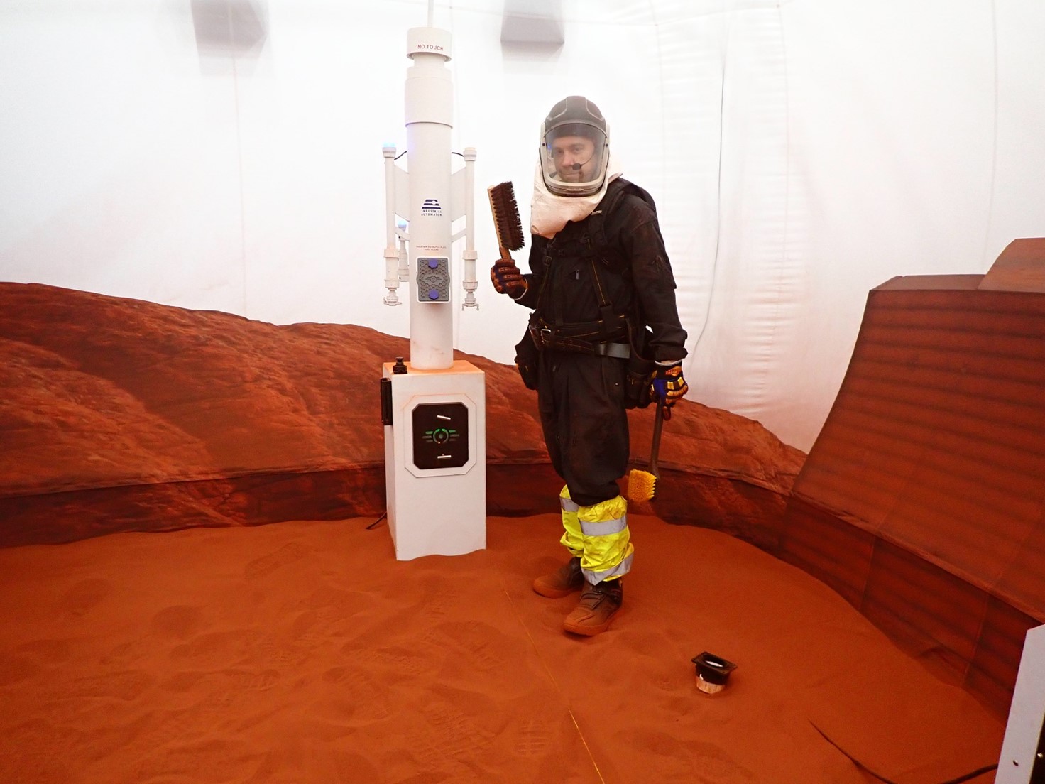 Nathan Jones participates in a simulated “Marswalk” inside the 1,200 square foot sandbox, which is connected to the habitat through an airlock.