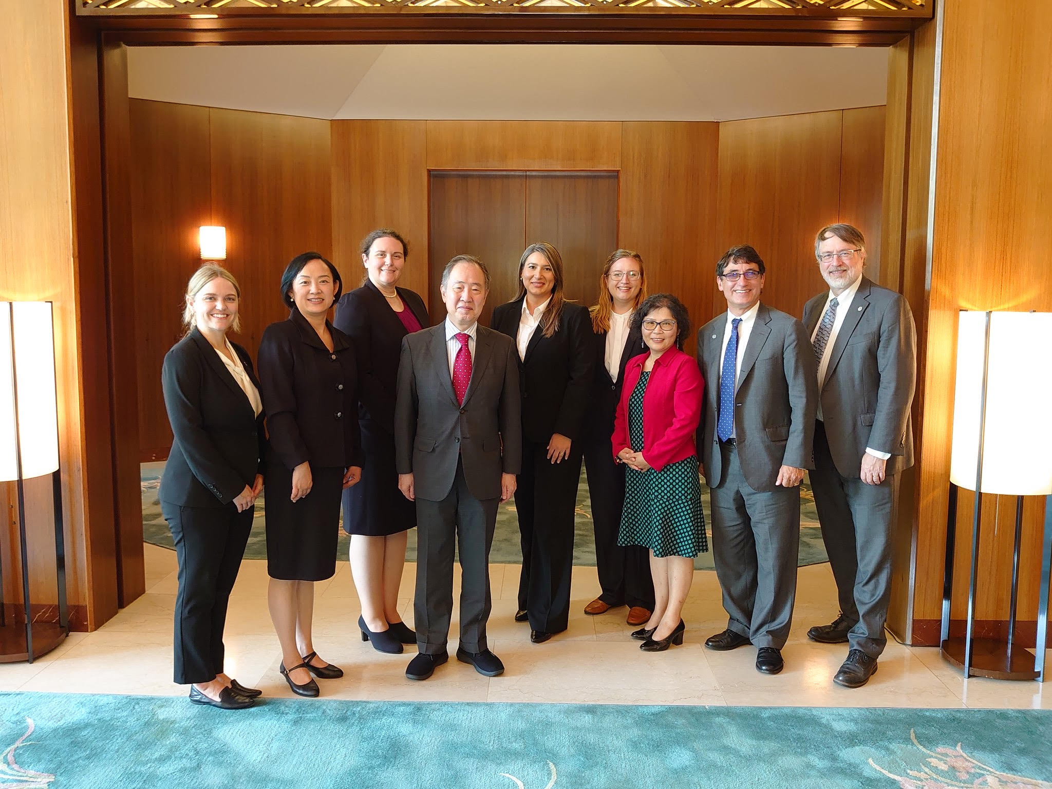 Katherine Cook, from NASA's Kennedy Space Center, visits with Koji Tomita, ambassador extraordinary and plenipotentiary of Japan to the United States