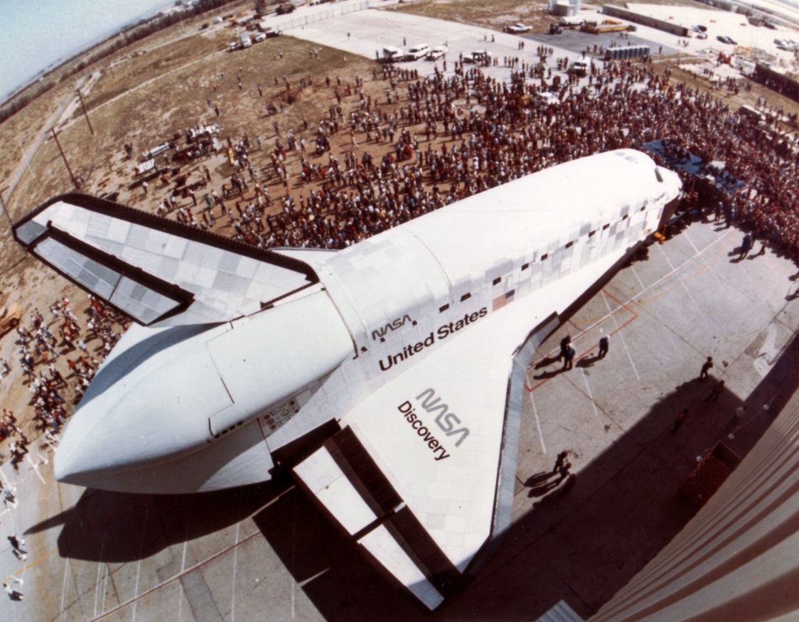 : Overhead view of space shuttle Discovery during the rollout ceremony at Rockwell International’s Palmdale, California, plant