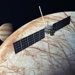 This illustration depicts NASA’s Europa Clipper as it flies by Jupiter’s moon Europa. The mission is targeting an October 2024 launch.