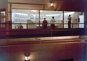 Men inside control room.