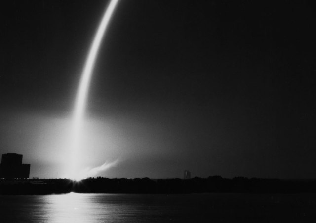 Rocket launch at night.