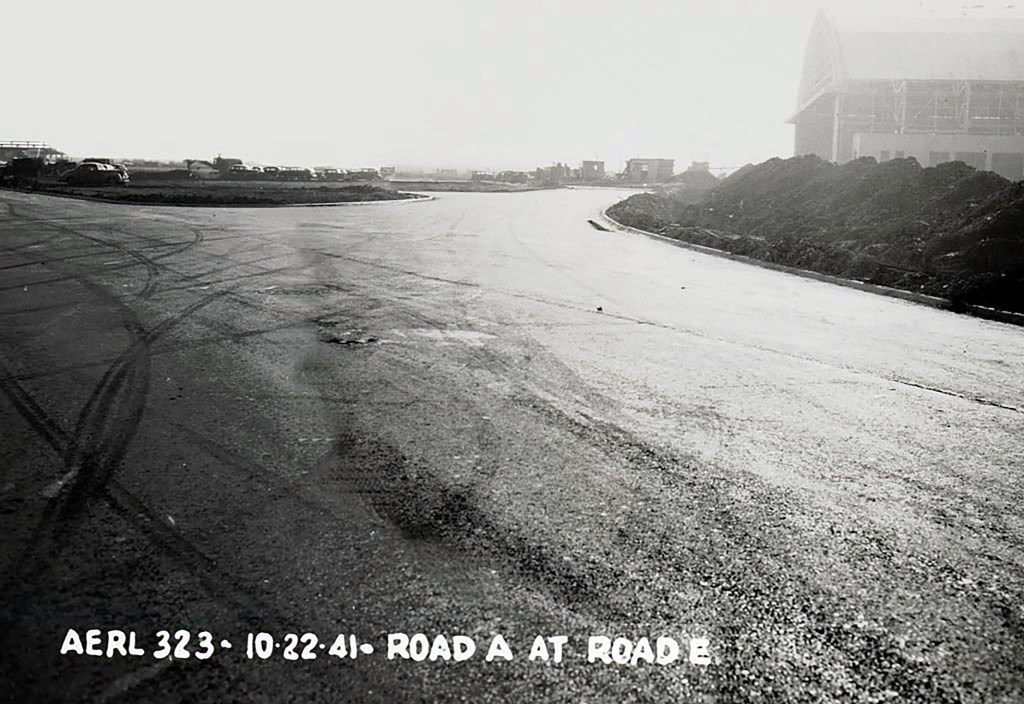 View of roads and hangar under construction.