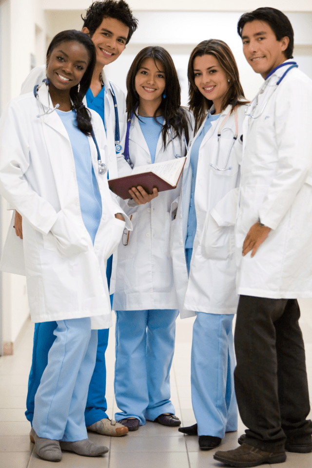 a group of doctors posing for a photo