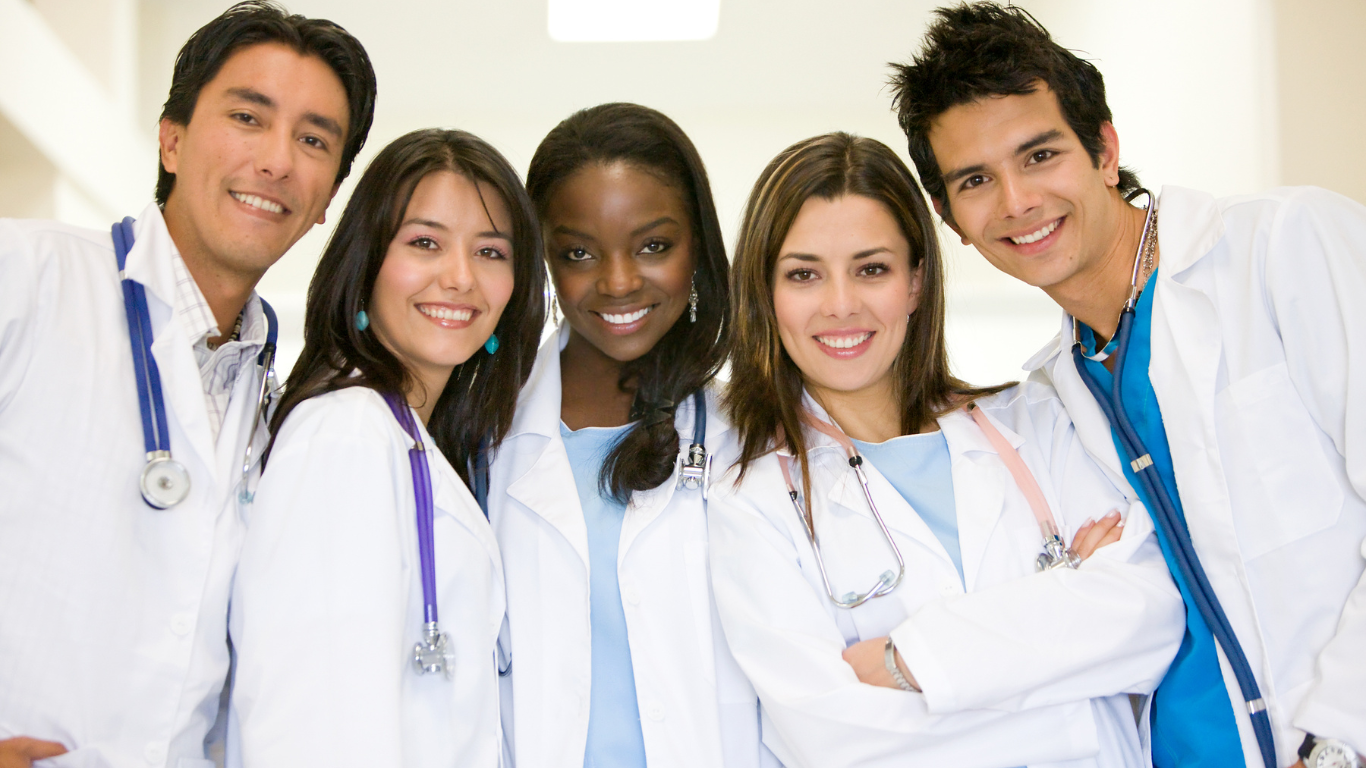 a group of doctors posing for a photo