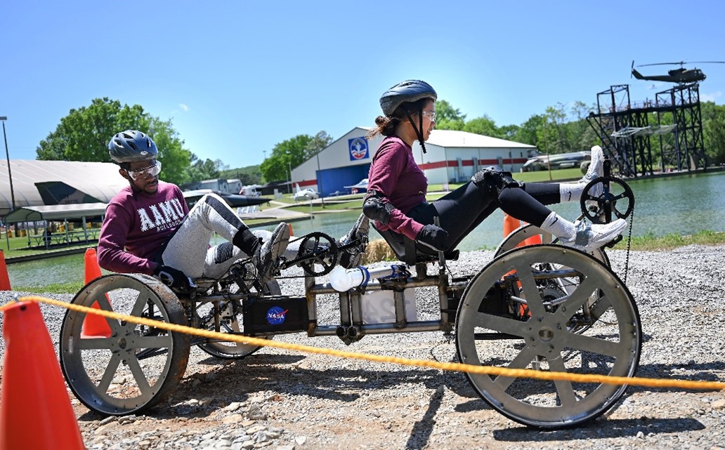 Students from Alabama A&M University near Huntsville, Alabama, pilot their vehicle through the obstacle course at the U.S. Space & Rocket Center during NASA’s Human Exploration Rover Challenge event on April 22, 2023. Credits: NASA