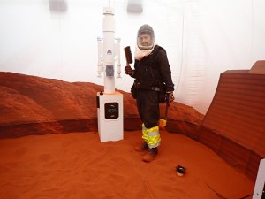 CHAPEA Mission 1 Medical Officer, Nathan Jones, participates in a simulated "Marswalk" inside the 1,200 foot sandbox. 