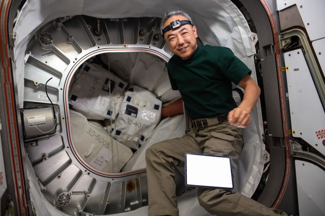 iss070e00324 (Sept. 28, 2023) --- JAXA (Japan Aerospace Exploration Agency) astronaut and Expedition 70 Flight Engineer Satoshi Furukawa packs hardware inside the Bigelow Expandable Activity Module, or BEAM, aboard the International Space Station.
