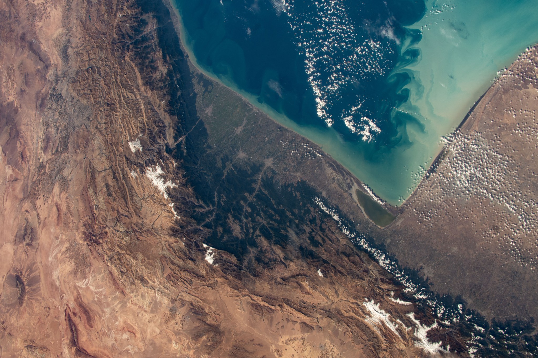 The Caspian Sea and cities and towns on the coast of northern Iran are pictured from the International Space Station as it orbited 259 miles above.