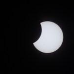 The Moon passes in front of the sun during the annular solar eclipse in this photograph taken by Expedition 70 Flight Engineer Jasmin Moghbeli aboard the International Space Station.