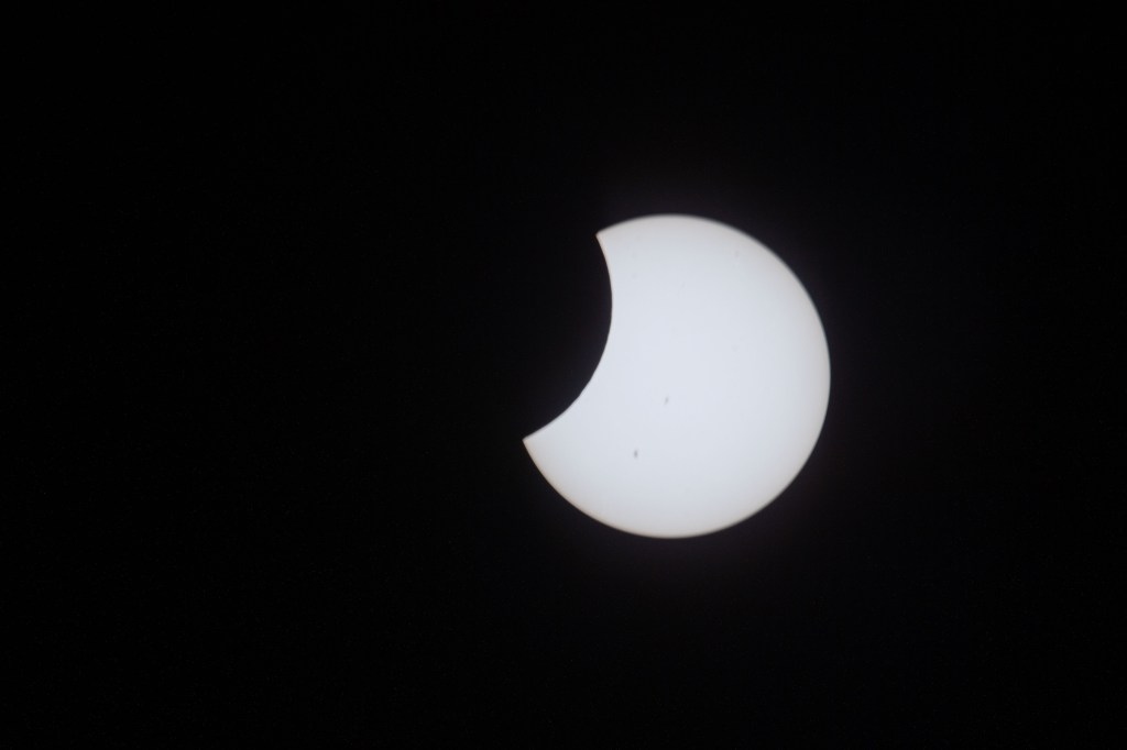 The Moon passes in front of the sun