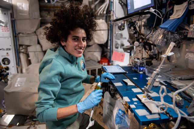 NASA astronaut and Expedition 70 Flight Engineer Jasmin Moghbeli uses DNA analysis to identify bacteria extracted from water samples collected aboard the International Space Station. Known as BioMole, the study is demonstrating the ability to monitor the spacecraft’s microbial environment without sending samples back to Earth for analysis.