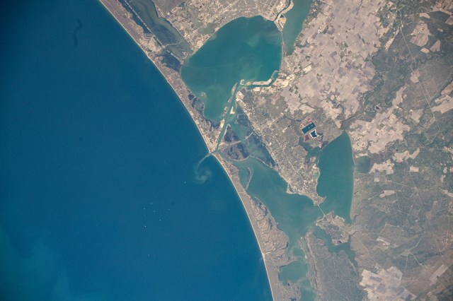 The Texas cities of Port Aransas and Corpus Christi, including the Padre and Mustang Islands on the coast of the Gulf of Mexico, are pictured from the International Space Station as it orbited 260 miles above.
