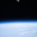 The first quarter Moon is pictured above Earth's horizon from the International Space Station as it orbited 260 miles above the African nation of Niger.
