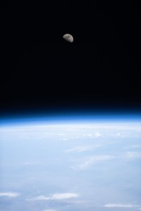 The first quarter Moon is pictured above Earth's horizon from the International Space Station as it orbited 260 miles above the African nation of Niger.
