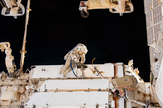 Expedition 70 Flight Engineer Nikolai Chub from Roscosmos is pictured during a spacewalk to inspect a backup radiator, deploy a nanosatellite, and install communications hardware on the International Space Station's Nauka science module.