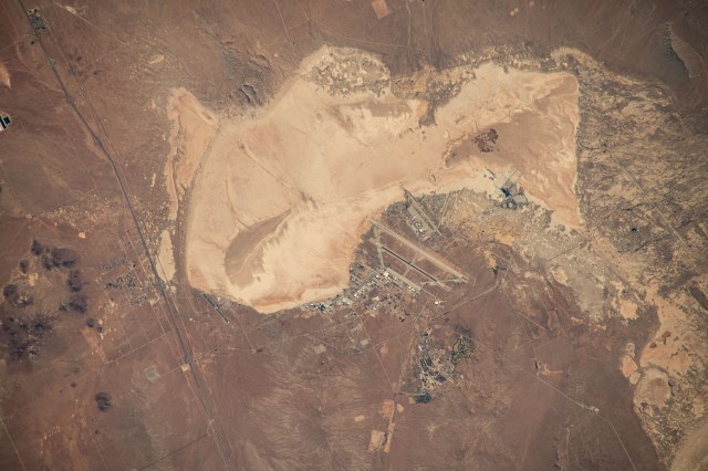 The Edwards Air Force Base complex, which also includes NASA's Neil A. Armstrong Flight Research Center, in California's Mojave Desert is pictured from the International Space Station as it orbited 261 miles above the Golden State.