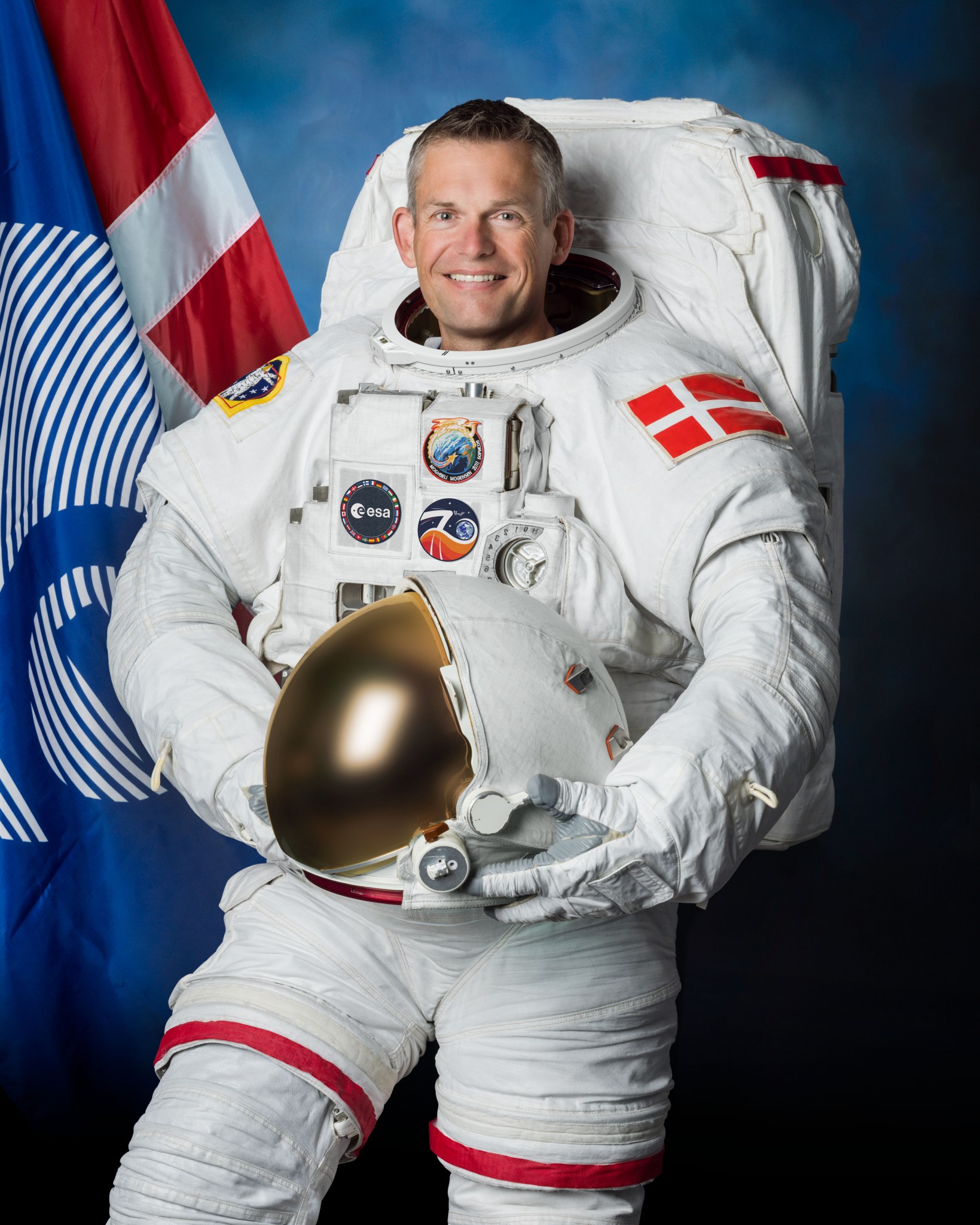 Official portrait of ESA (European Space Agency) astronaut Andreas Mogensen in a spacesuit.