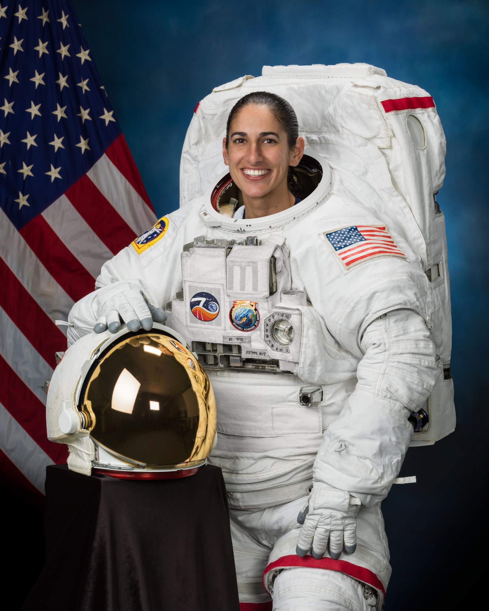 Official portrait of NASA astronaut Jasmin Moghbeli in a spacesuit.