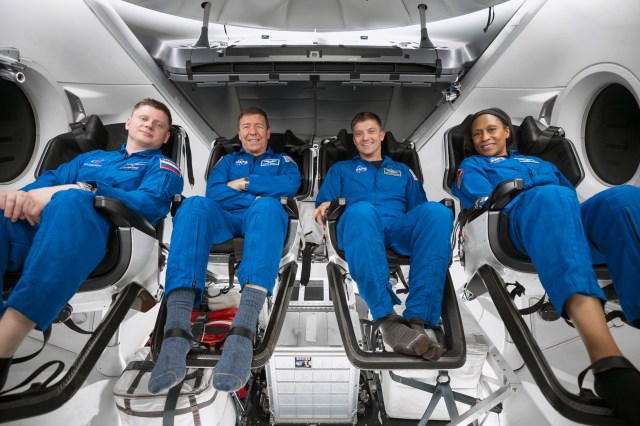 The four SpaceX Crew-8 crew members (from left) Alexander Grebenkin from Roscosmos; Michael Barratt, Matthew Dominick, and Jeanette Epps, all NASA astronauts, are pictured training inside a Dragon mockup crew vehicle at SpaceX headquarters in Hawthorne, California. Credit: SpaceX