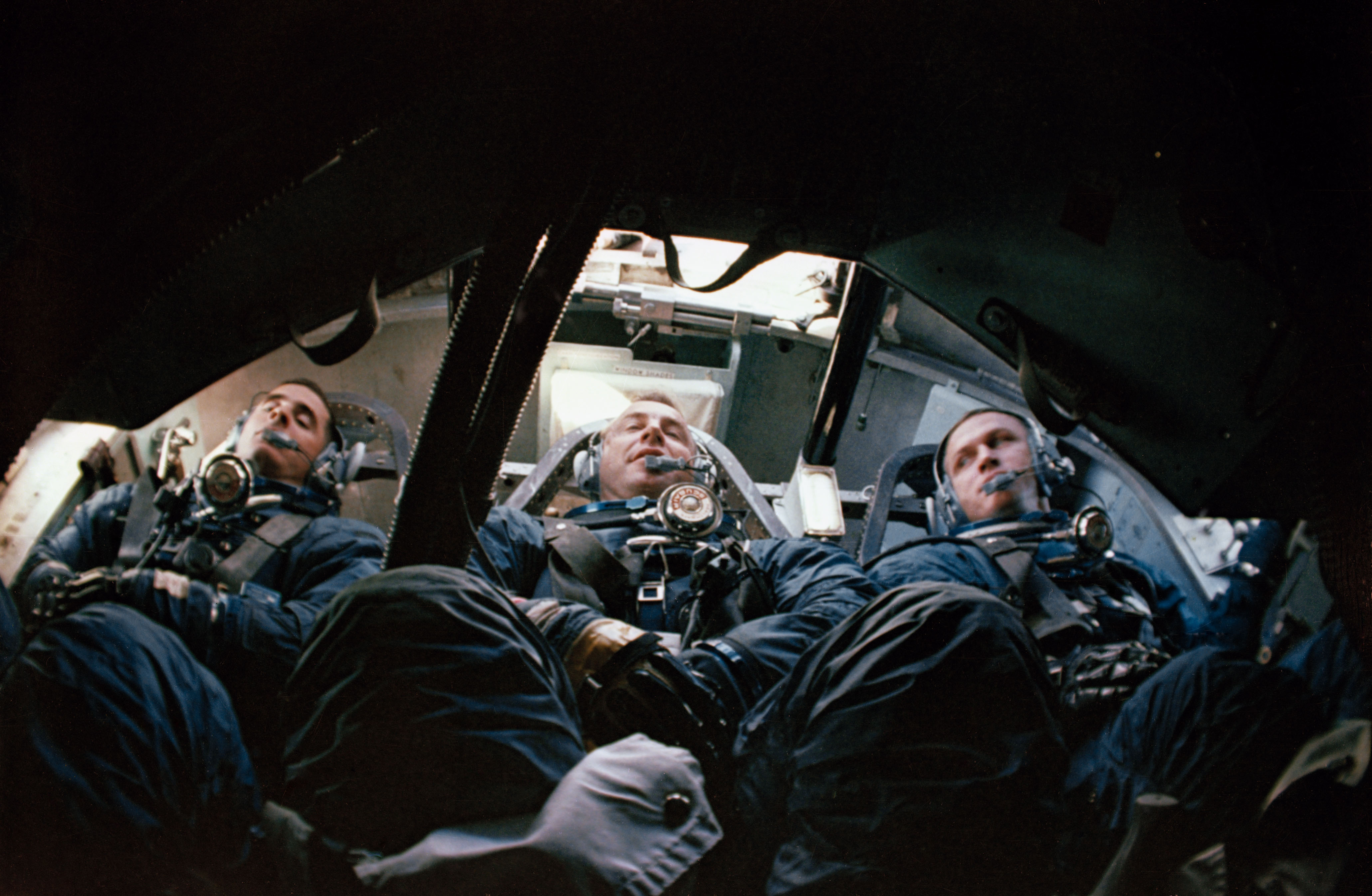 Anders, Lovell, and Borman inside the boilerplate Apollo spacecraft during the water egress test