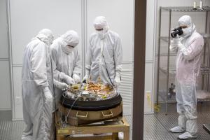 Curation teams process the sample return capsule from NASA’s OSIRIS-REx mission in a cleanroom, Sunday, Sept. 24, 2023, at the Department of Defense's Utah Test and Training Range. Photo Credit: NASA/Keegan Barber
