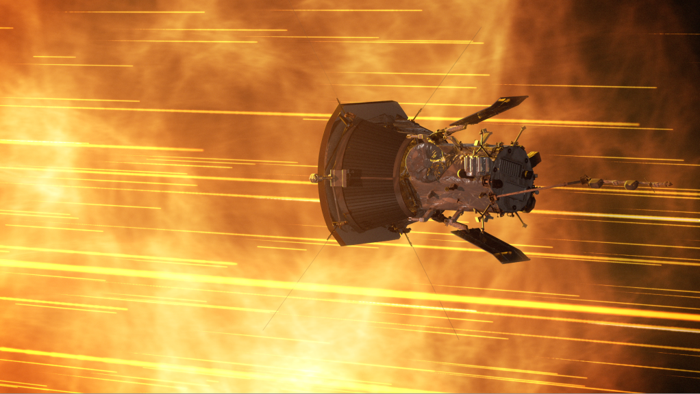 NASA's Parker Solar Probe -- with its heat shield facing forward and twin solar panels partially extended -- flies through particles in space.