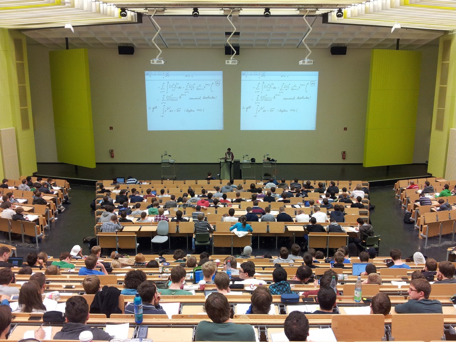 Auditorium of students with a speaker at the front 