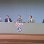 STS-26 astronauts during the postflight press conference at JSC