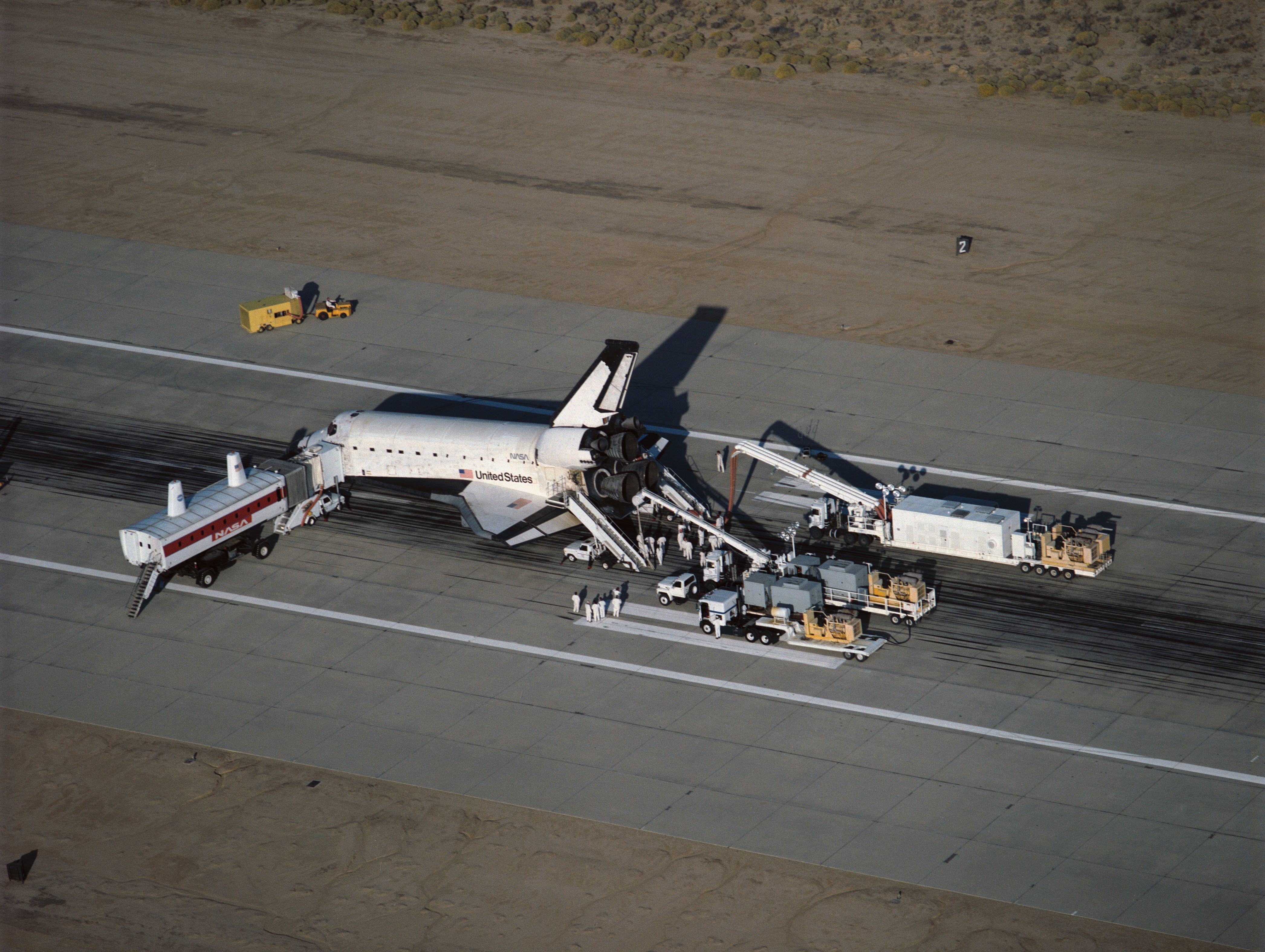 The seven STS-58 SLS-2 crew members have exited Columbia and transferred to the Crew Transport Vehicle to begin postflight data collection