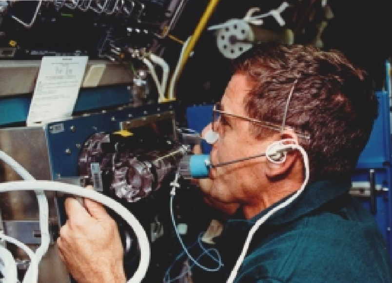 William S. McArthur uses a metabolic gas analyzer to monitor his pulmonary or lung function