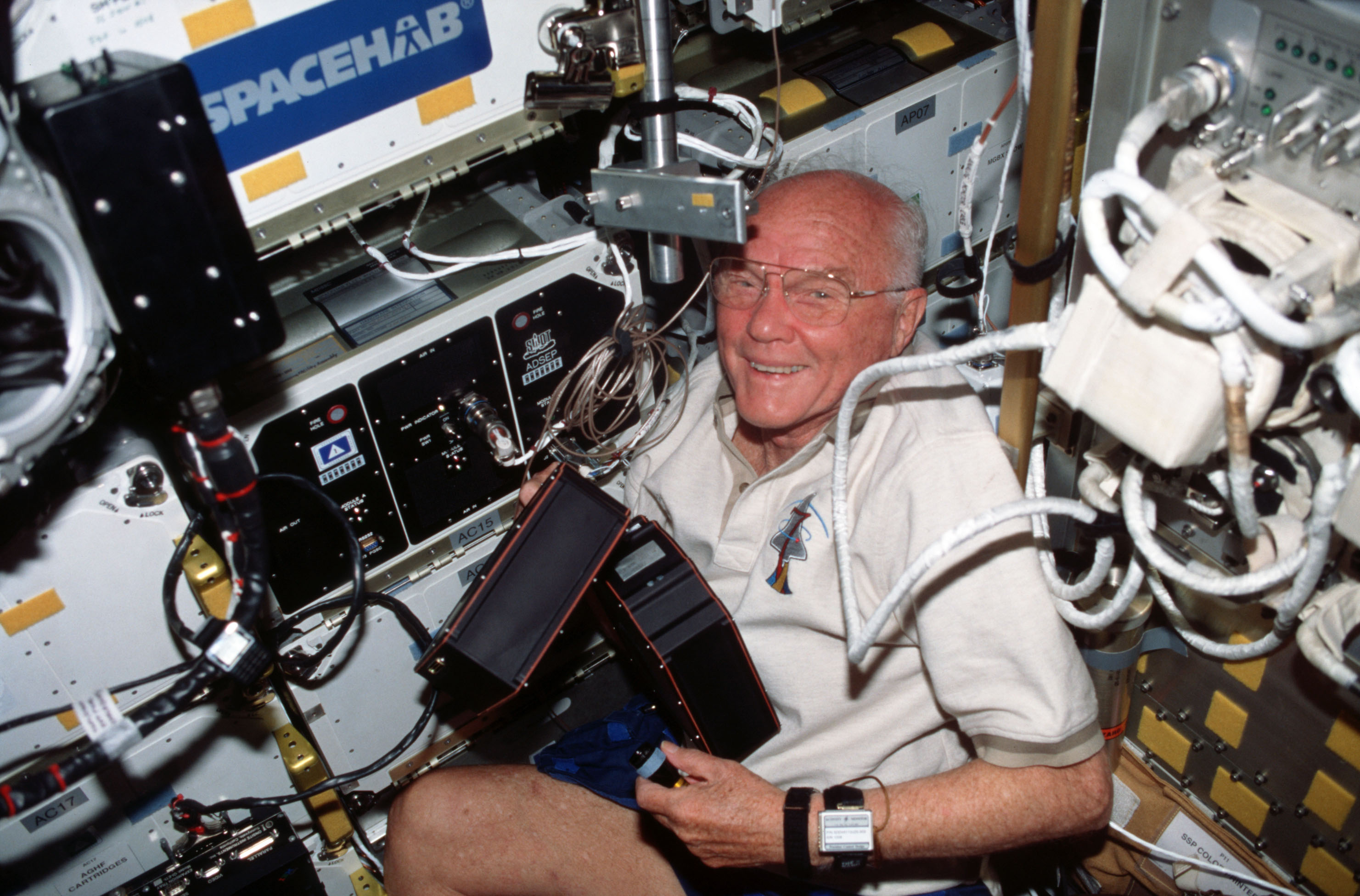 John H. Glenn removes cartridges from the Advanced Separation (ADSEP) experiment