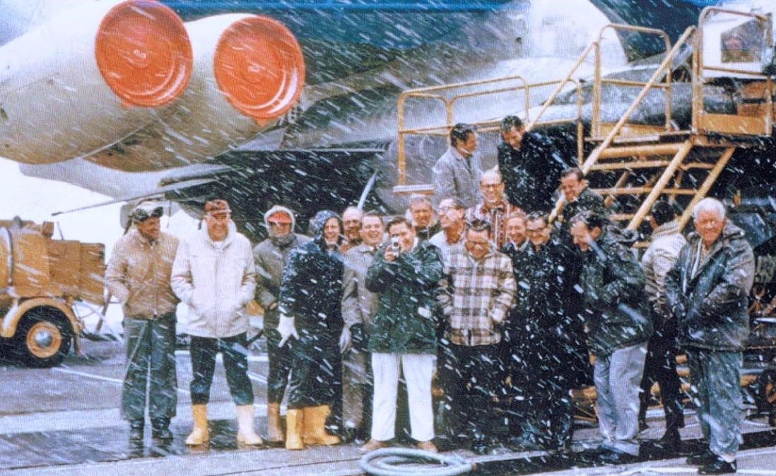 The Edwards Air Force Base ground crew poses in front of the B-52 with X-15-1 mounted under its wing during a rare snowstorm that thwarted a final attempt at a 200th flight