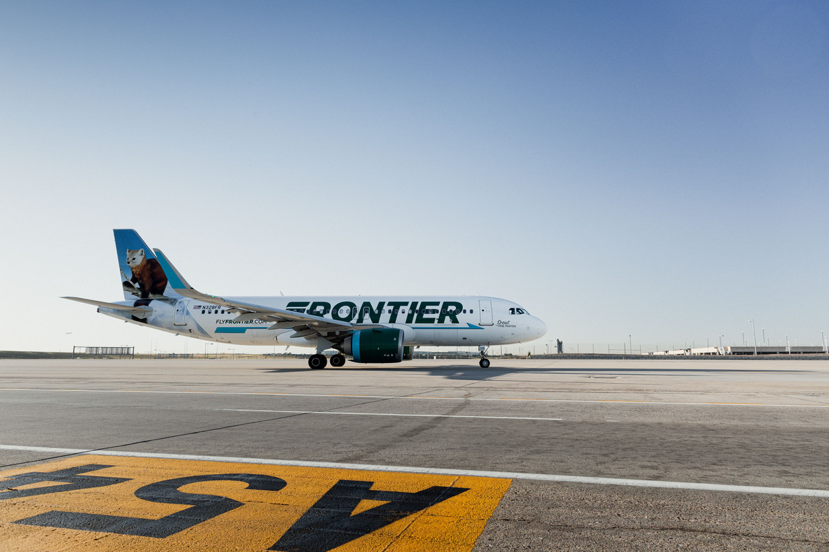 Frontier Airlines passenger plane on runway.