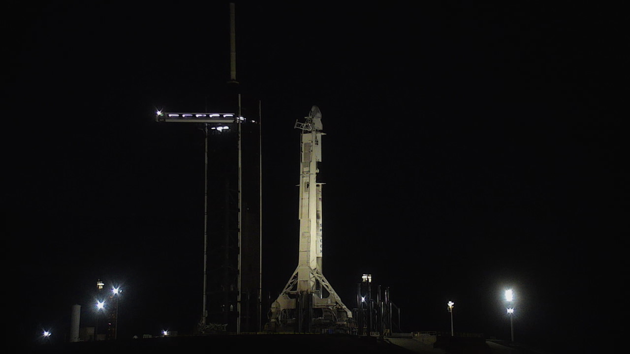 SpaceX’s Falcon 9 rocket, with the company’s Dragon spacecraft atop, stands tall at NASA Kennedy Space Center’s Launch Complex 39A